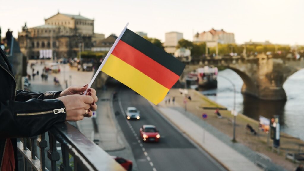 Groß (holding german flag overlooking dresden architectu 2026 03 25 06 31 56 utc)
